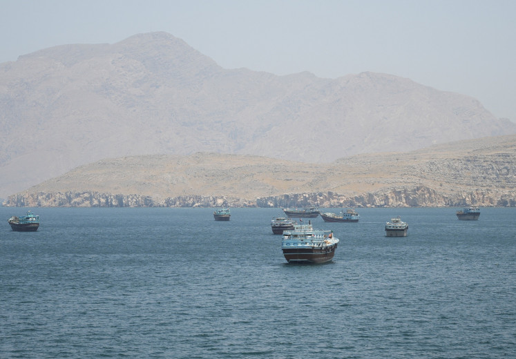 Vessels in a part of the Strait of Hormuz in Musandam, Oman, on May 8, 2026.
