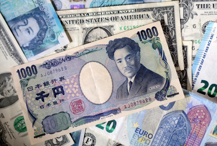 US dollar, Euro, Yen and Pound banknotes are seen in this illustration created on May 4, 2025.