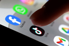 The icons of Facebook, What'sApp and TikTok are seen on a smartphone screen in this illustration photo taken Oct. 27, 2025.