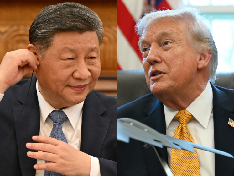 This combination of pictures created on March 16, 2026 shows (L) China's President Xi Jinping attending a meeting with a group of foreign executives at the Great Hall of the People in Beijing on March 28, 2025, and (R) US President Donald Trump speaking after signing an executive order on fraud in the Oval Office at the White House in Washington, DC, on March 16, 2026. US President Donald Trump is due to visit China on May 14-15, 2026, where he is expected to meet with leader Xi Jinping, after delaying an earlier summit because of the Iran war. 