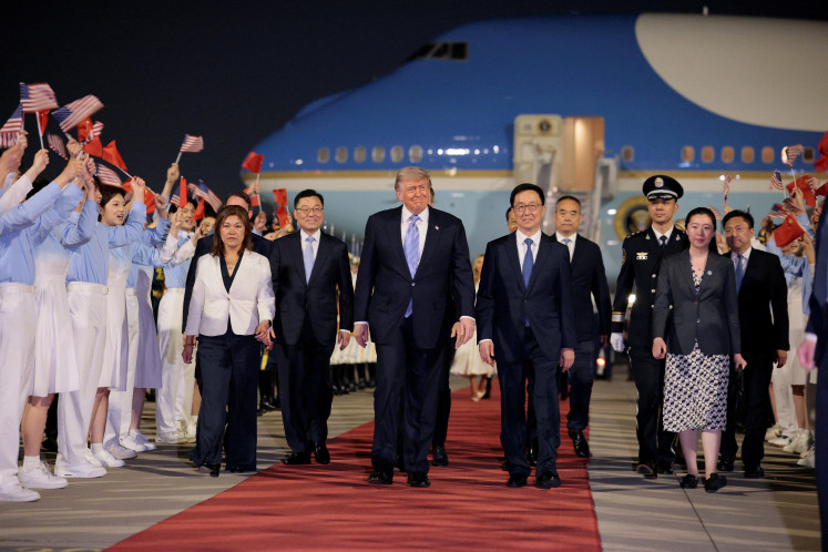 United States President Donald Trump participates in an arrival ceremony at Beijing Capital International Airport during his visit to the country, in Beijing, China, May 13, 2026.