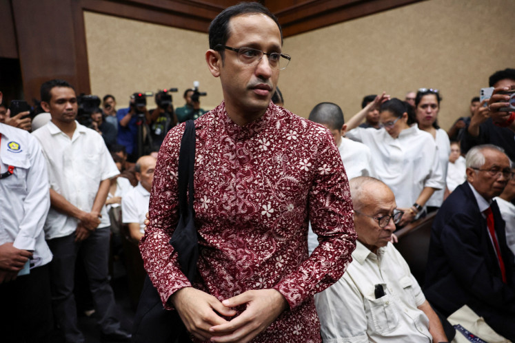 Nadiem Makarim, former education minister and co-founder of ride-hailing firm Gojek, arrives for a hearing over alleged corruption related to the procurement of Google Chromebook laptops at the Jakarta Corruption Court on May 13, 2026. 