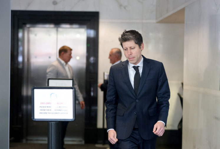 OpenAI CEO Sam Altman arrives at the federal courthouse, as the trial in Elon Musk's lawsuit over OpenAI's for-profit conversion continues, in Oakland, US, on May 14, 2026.
