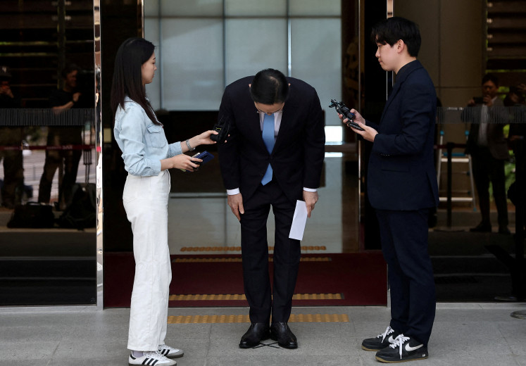 Samsung Electronics Chairman Jay Y. Lee bows as he apologizes over Samsung's labor dispute in his first public comments on the issue, in Seoul, on May 16, 2026.