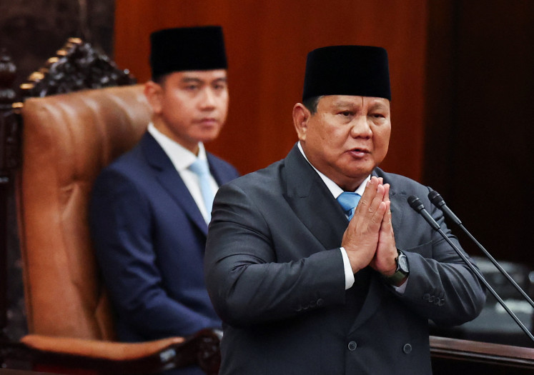 President Prabowo Subianto (right) gestures inside the House of Representatives building, while Vice President Gibran Rakabuming Raka looks on, on May 20, 2026, the day Subianto delivered his speech on economic policies and the 2027 fiscal plan, Central Jakarta.