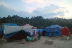 Aceh flood survivors remain in tents six months after disaster