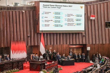 President Prabowo Subianto delivers a speech on the macroeconomic framework to lawmakers at the House building in Jakarta on May 20, 2026. 
