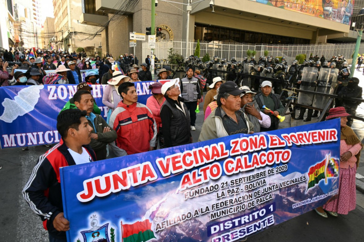Farmers protest in demand of the resignation of Bolivia's President Rodrigo Paz in La Paz, on May 20, 2026. 