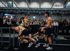 All legs: Participants of an unofficial Hyrox event in power through the sled push in this undated photo.