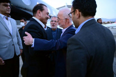 This handout photograph taken and released on May 22, 2026 by Pakistan's Inter-Services Public Relations (ISPR) shows visiting Pakistan&rsquo;s Army Chief Syed Asim Munir (second left) being greeted by Iran&rsquo;s Interior Minister Eskandar Momeni upon his arrival in Tehran as part of ongoing mediation efforts between Iran and the United States.