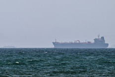 A vessel is anchored off the coast of Sharjah in the United Arab Emirates on May 21, 2026. Iran's new body overseeing the Strait of Hormuz said its claimed area of control extends to Emirati waters, drawing a sharp rebuke from the Gulf neighbour as the traffic through Hormuz, a vital global shipping conduit, has come under Iranian control since the outbreak of war with Israel and the United States on Feb. 28.