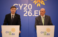 European Commissioner for Economy and Productivity Valdis Dombrovskis and Cyprus' Minister of Finance Makis Keravnos attend a press conference during an informal meeting of the Economic and Financial Affairs Council (ECOFIN), in Nicosia on May 23, 2026. 
