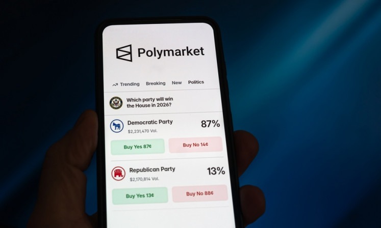 The application of prediction market Polymarket is displayed on a smartphone on April 10, 2026.