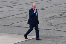 US President Donald Trump speaks to members of the media as he walks to board Air Force One at Morristown Airport after delivering remarks at SUNY Rockland Community College on May 22, 2026, in Morristown, New Jersey, United States.