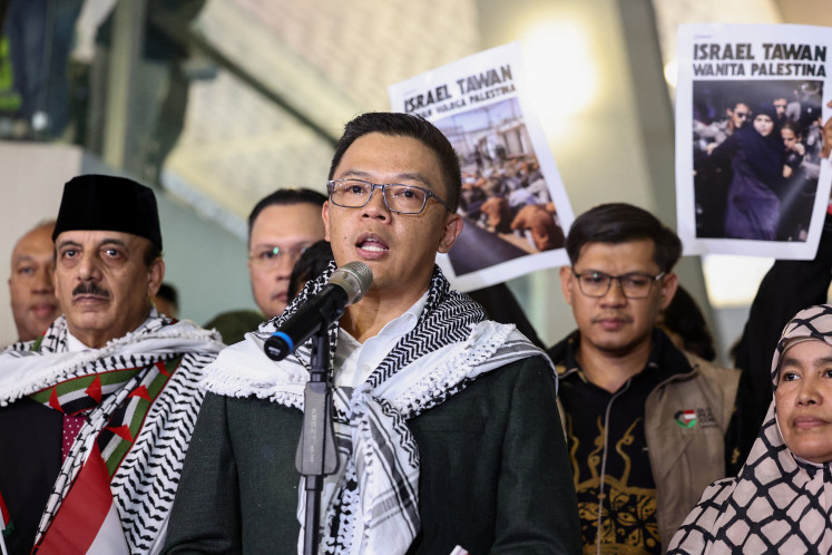 Foreign Minister Sugiono (center) addresses reporters on May 24, 2026, accompanied by the nine Indonesian members of the Gaza-bound Global Sumud Flotilla, upon their arrival at Soekarno-Hatta International Airport in Tangerang, Banten. 