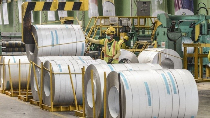 Quality control: A worker at a steel factory in the Cikarang industrial estate in Bekasi, West Java, inspects the quality of product on Oct. 4, 2019. 