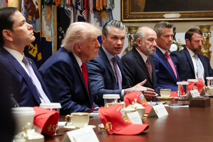 US Secretary of War Pete Hegseth (center) speaks as (left to right) US Secretary of State Marco Rubio, US President Donald Trump, US Commerce Secretary Howard Lutnick, US Transportation Secretary Sean Duffy and US Secretary of Homeland Security Markwayne Mullin listen during a Cabinet meeting in the Cabinet Room of the White House on May 27, 2026 in Washington, DC. 