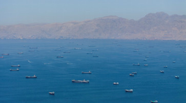 A drone view shows vessels anchored at the Strait of Hormuz, as seen from Musandam, Oman, May 25, 2026. 