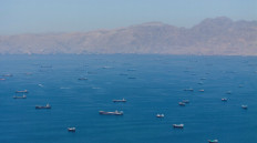 A drone view shows vessels anchored at the Strait of Hormuz, as seen from Musandam, Oman, May 25, 2026. 