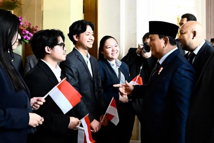 Diaspora connection: President Prabowo Subianto (second right) greets Indonesian students based in France on May 26, 2026 as he arrives in Paris for a state visit.