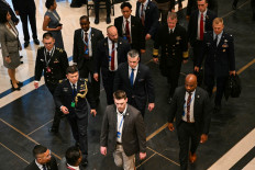 US Secretary of Defense Pete Hegseth (center) arrives for a bilateral meeting with Singapore's Defense Minister Chan Chun Sing on the sidelines of the Shangri-La Dialogue Summit in Singapore on May 29, 2026.