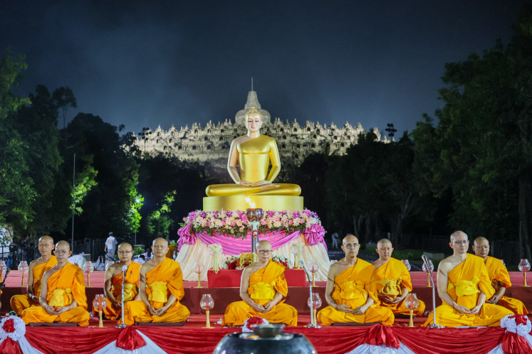 Buddhist monks meditate on May 31 at the foot of Borobudur Temple in Magelang, Central Java, as part of the Waisak celebration marking the year 2,570 in the Buddhist Era.