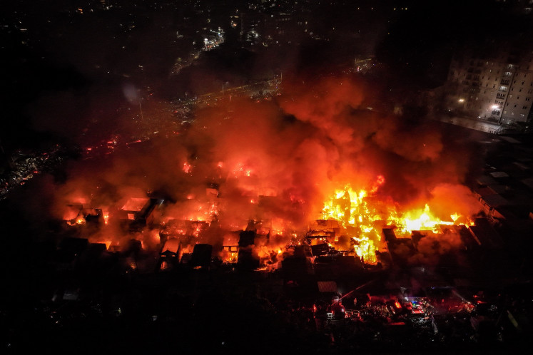 A large fire takes hold of a densely populated neighborhood in Jl. Kemayoran Gempol in Kebon Kosong subdistrict, Kemayoran district, Central Jakarta engulfed in fire on June 1, 2026. The Jakarta Fire and Rescue Agency deployed 33 fire trucks and more than 150 personnel to extinguish the fire.