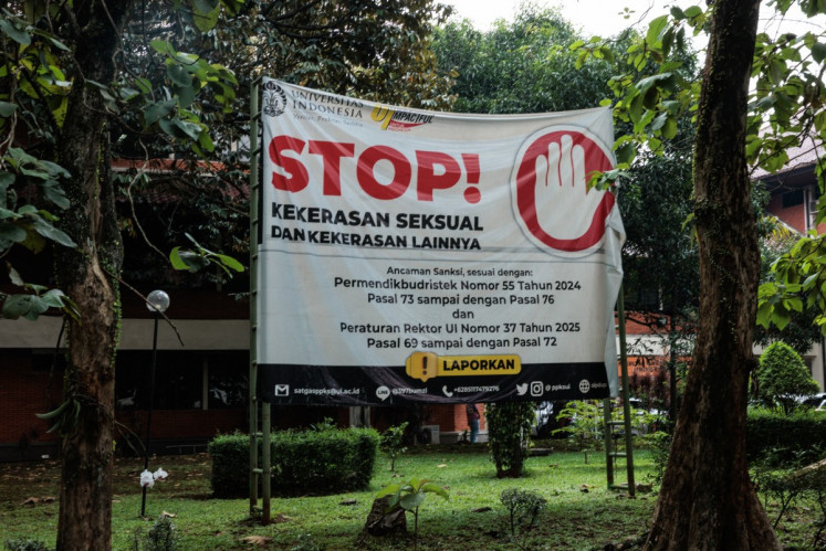 A banner reading &ldquo;Stop sexual violence and other violence&rdquo; hangs along a roadside on April 16 at the University of Indonesia&rsquo;s campus in Depok, West Java.