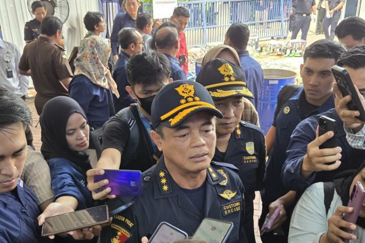 Customs and Excise Director General Djaka Budhi Utama attends a press conference on the destruction of smuggled goods at the Jakarta Customs and Excise Office on Dec. 3, 2025. 