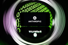 This photograph shows a smartphone displaying the logo of US artificial intelligence company Anthropic in Mulhouse, France, on April 21, 2026.