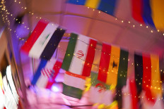 The Iranian flag hangs in a bar downtown in Tijuana, Mexico, on June 2, 2026, as part of decorations for the FIFA World Cup 2026. The Iranian national soccer team is set to establish its base camp for the event in Tijuana after Mexico&rsquo;s President Claudia Sheinbaum agreed to host the squad, following reports that the United States government did not want Iran to remain at its original base in Arizona during the tournament.