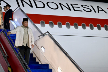 President Prabowo Subianto disembarks presidential aircraft Indonesia One at Halim Perdanakusuma Air Force Base in East Jakarta on April 1, 2026, after completing his four-day tour to Japan and South Korea. 