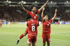 Indonesia U-19 players Evandra Florasta (top), Arkhan Kaka Putra Purwanto (bottom left) and Welberlieskott De Halim Jardim (right) celebrate after scoring against Vietnam during the AFF U-19 Championship 2026 soccer match at the North Sumatra Main Stadium in Deli Serdang Regency, North Sumatra, on June 7, 2026. Indonesia defeated Vietnam 2-1 to secure a place in the semifinals.