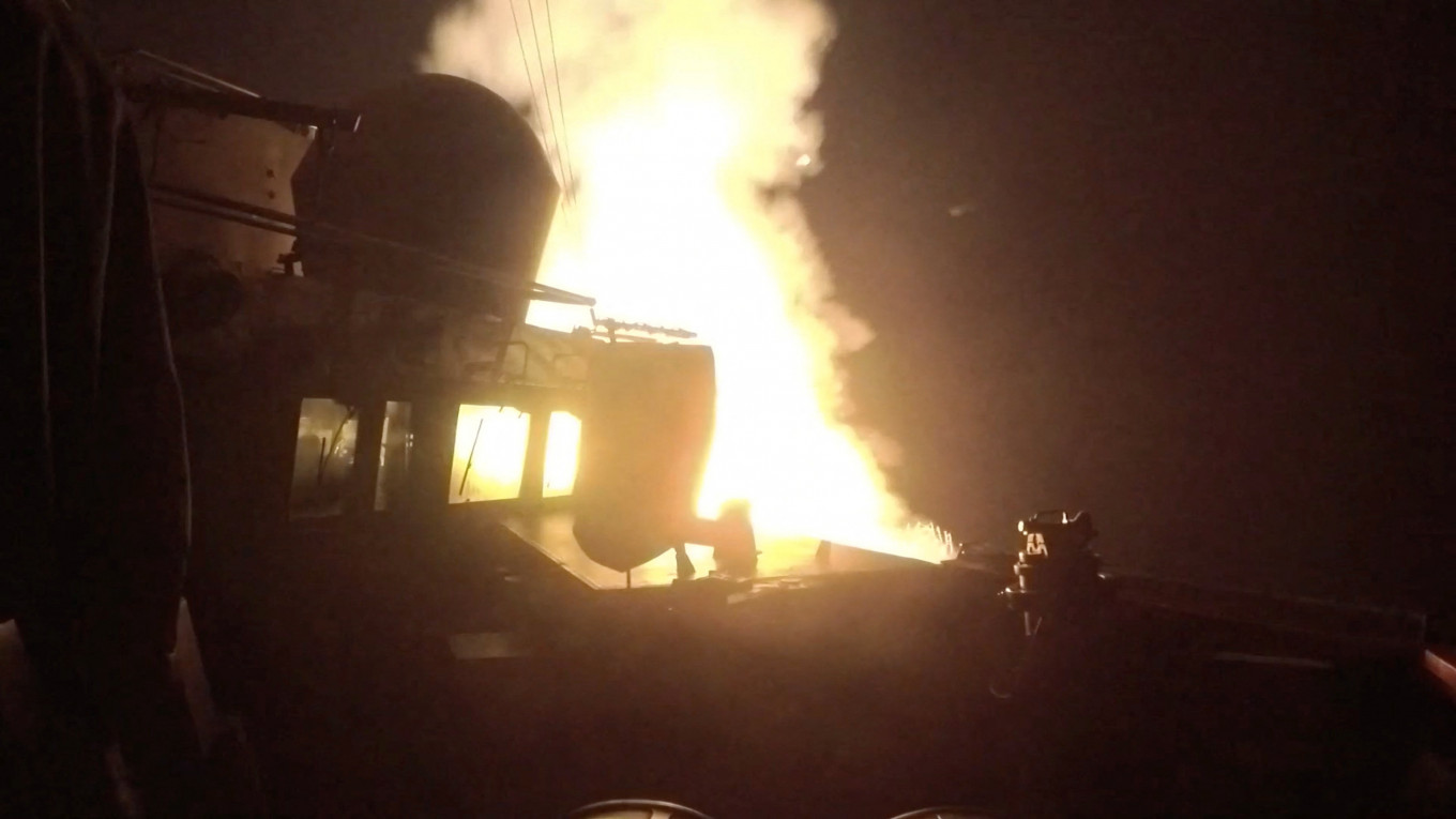 USS Michael Murphy (DDG 112) launches Tomahawk cruise missiles from an unknown location, as the United States launched new strikes against multiple targets overnight in Iran, the US military said on Wednesday, in this still image obtained from a handout video released on June 10, 2026. 