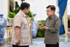 Former vice president Jusuf Kalla (right) gestures while speaking with President Prabowo Subianto on June 11, 2026, during a meeting at the State Palace in Jakarta.
