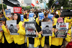 University students take part in a protest on Friday against government policies, including state budget spending, fuel price hikes, the free nutritious meal program and expanded military roles in civilian affairs, in Jakarta.