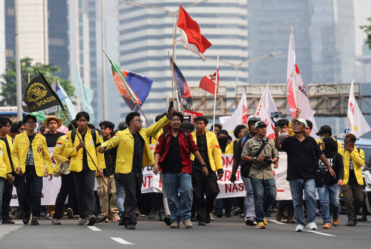 University students take part in a protest on June 12 against government policies, including state budget spending, fuel price hikes, the free nutritious meal program and expanded military roles in civilian affairs, in Jakarta. 