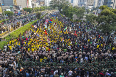 Hundreds of students protest against fuel prices and the free nutritious meal program, which they consider to be a hotbed of corruption, in Jakarta on June 12, 2026. 