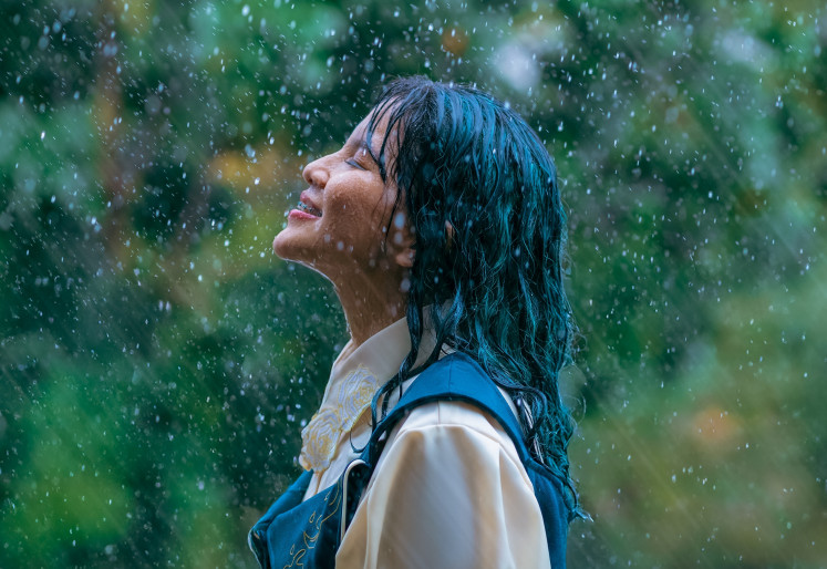 Love in the rain: Idgitaf's latest full-length album, Berusaha di Bawah Hujan, is inspired by her relationship. Thematically, the album touches on falling in love, romantic challenges, romantic resilience and emotional growth.