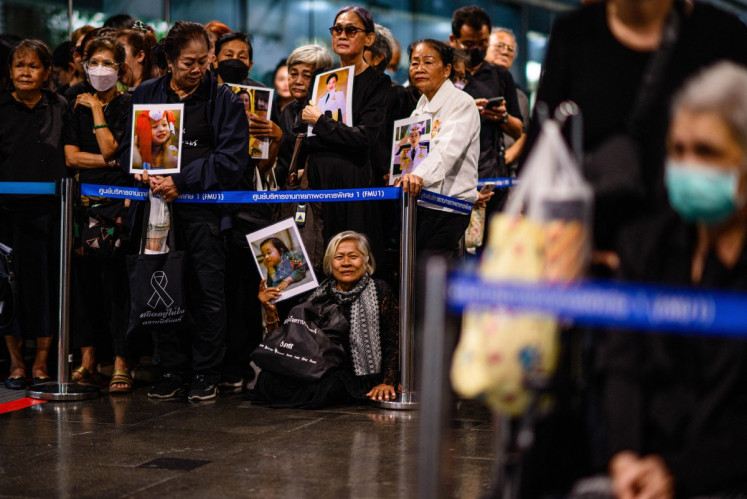 Mourners hold photos of Thai Princess Bajrakitiyabha Mahidol inside Chulalongkorn Hospital in Bangkok on June 12, 2026. Thai Princess Bajrakitiyabha Mahidol, the king's eldest daughter, has died aged 47, the royal palace announced on June 12, more than three years after she was hospitalized following a sudden illness.