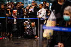 Mourners hold photos of Thai Princess Bajrakitiyabha Mahidol inside Chulalongkorn Hospital in Bangkok on June 12, 2026. Thai Princess Bajrakitiyabha Mahidol, the king's eldest daughter, has died aged 47, the royal palace announced on June 12, more than three years after she was hospitalized following a sudden illness.