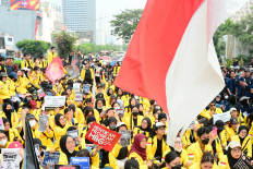 University students take part in a protest against government policies on Friday in Jakarta, Indonesia. Demonstrators criticized state budget spending, fuel prices, the government's free nutritious meal program and the expanded role of the military in civilian affairs.