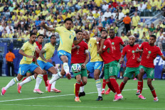 Brazil's defender Marquinhos (fourth left) kicks the ball during the 2026 FIFA World Cup Group C match between Brazil and Morocco at the New York/New Jersey Stadium in East Rutherford, the United States on June 13, 2026.