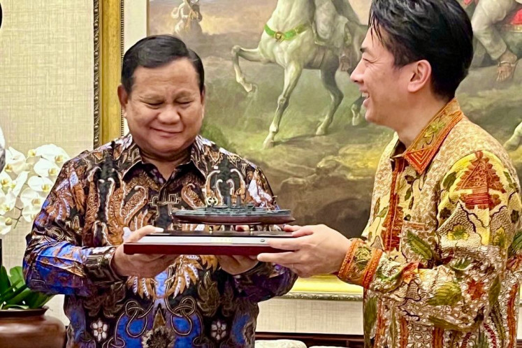 President Prabowo Subianto (left) exchanges a miniature ship as a memento with Japanese Defense Minister Shinjiro Koizumi on June 12, 2026, during a courtesy call at Prabowo's private residence on Jl. Kertanegara in South Jakarta. Koizumi also met his Indonesian counterpart Sjafrie Sjamsoeddin to discuss various topics, including the transfer of Japanese Asagiri-class destroyers.