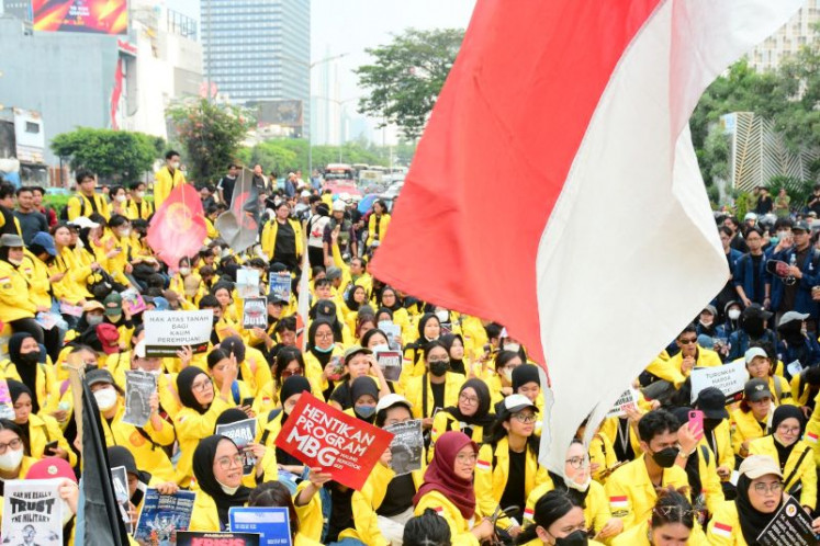 Yellow wave: Students wear jackets in their school colors on June 12, 2026, as they take part in a massive street protest in Central Jakarta against government policies including fuel price hikes, the free nutritious meal program and the Indonesian Military&rsquo;s expanded role in civilian affairs.