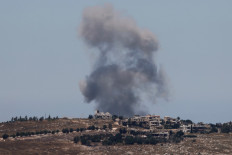 A photograph taken from the southern Lebanese region of Marjayoun shows smoke rising following an Israeli strike near Nabatieh al-Fawqa on June 19, 2026. 