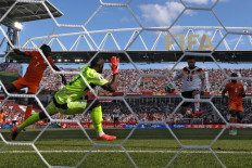 Germany's forward #26 Deniz Undav (second right) scores his team's first goal during the 2026 World Cup Group E football match between Germany and Ivory Coast at the Toronto Stadium in Toronto on June 20, 2026.  