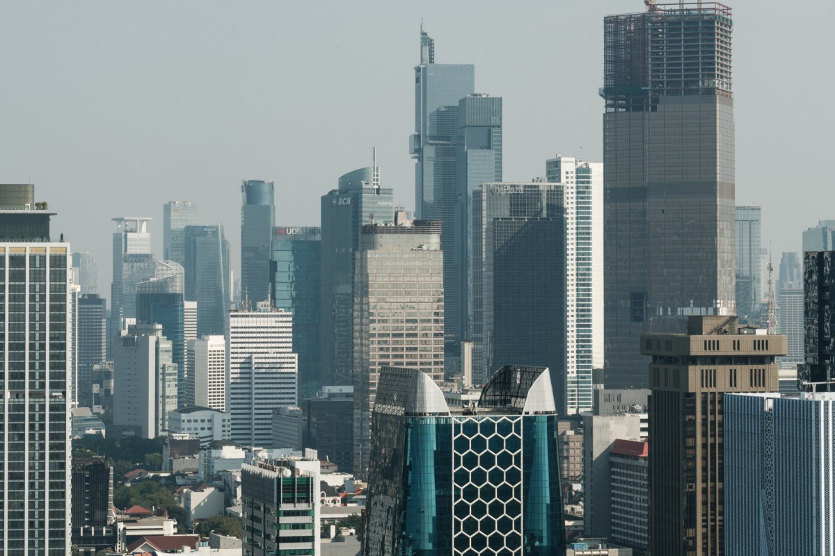 Skyscrapers are seen from the observation deck of the National Monument (Monas), a 132-meter landmark commemorating Indonesia's independence, in Jakarta on June 7, 2026. 