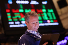 A trader works on the floor of the New York Stock Exchange during morning trading on Jan. 24, 2025 in New York City, the United States.