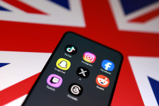 A Union Jack flag and social media app icons are seen in this illustration taken June 15, 2026.